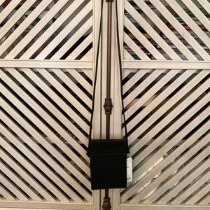 Perfect size black crossbody by Uni Qlo